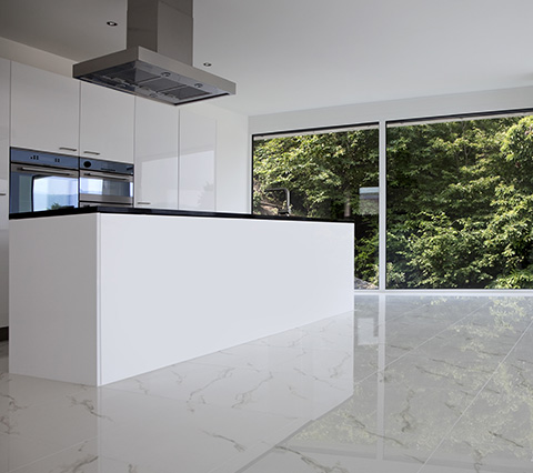 Kitchen with large white tiles